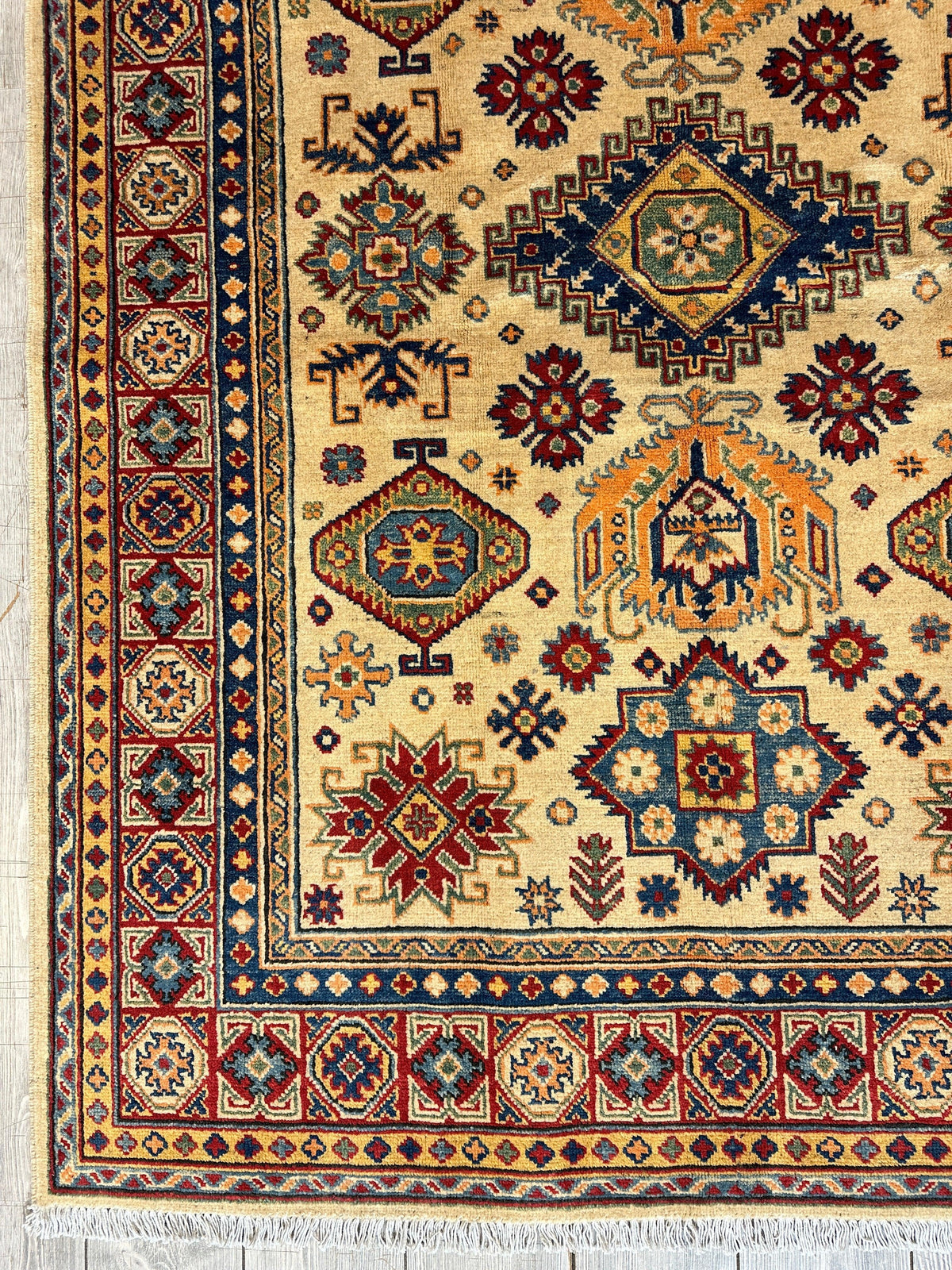 Afghan Kazak Medallion Rug 5x7 | Ivory, Red, Navy & Light Blue | Hand-Knotted Wool - Rugistan, view 7
