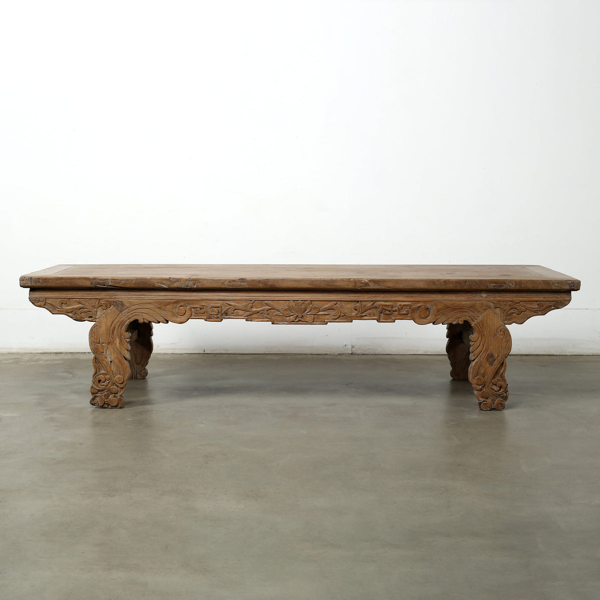 Approx. 85" Long 26.4" Deep Vintage Coffee Table with Lotus Motif on the Front Panel and Carved Legs