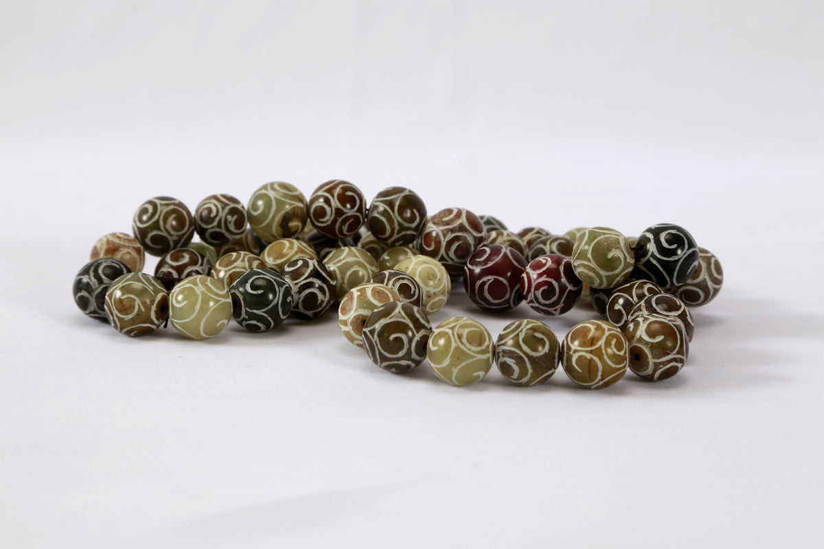 Colored Jade Bead with Carving