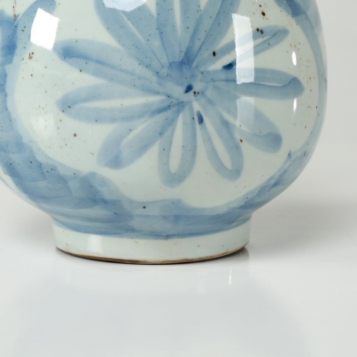13" High Blue and White Decorative Vase with Floral and Leaf Motif