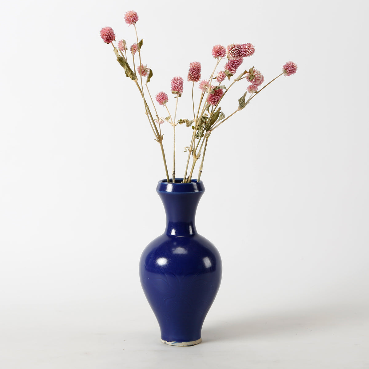 Dark blue glaze vase with tick flowers