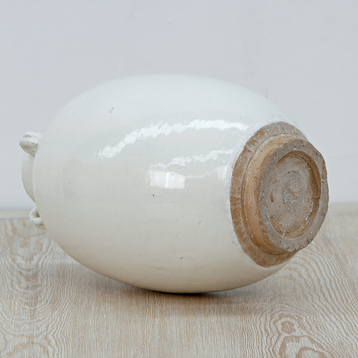 12" Off White Ceramic Pot with Four Handles Unglazed Base