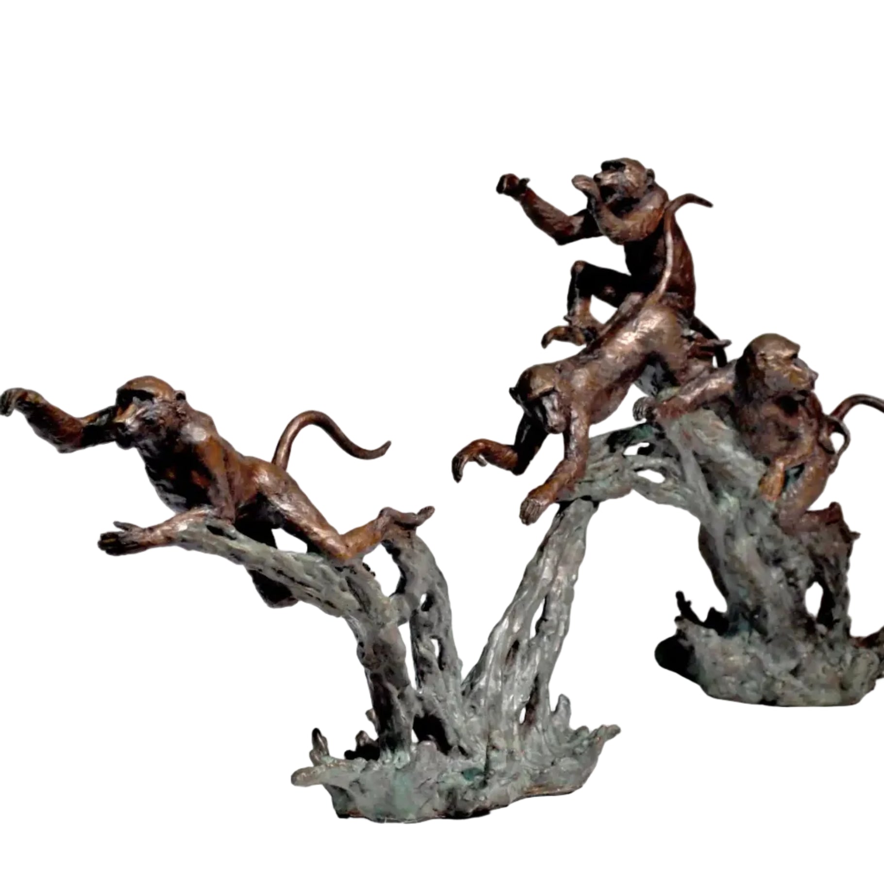 Bronze sculpture of four playful monkeys climbing and leaping on gnarled tree branches, displayed against a neutral light gray background.