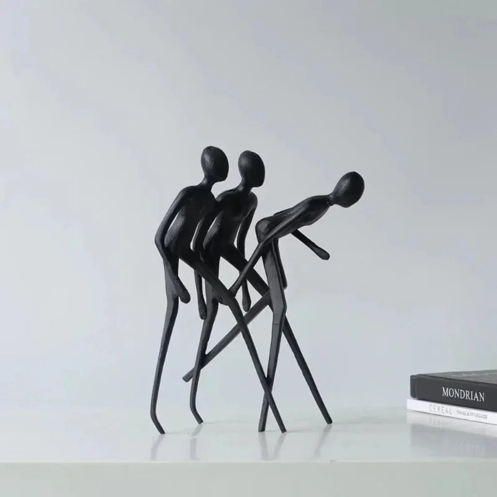 Human Sculpture Matte Black Iron Trio for Your Living Room