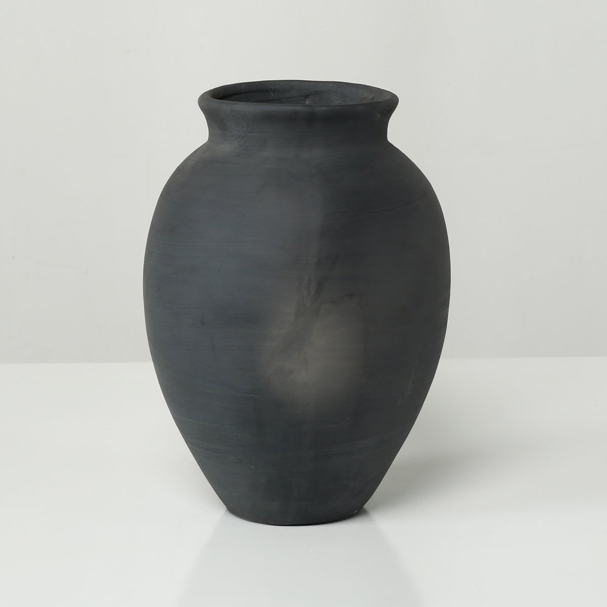 Approx. 11" High 8" Round Charcoal Gray Pottery Vase