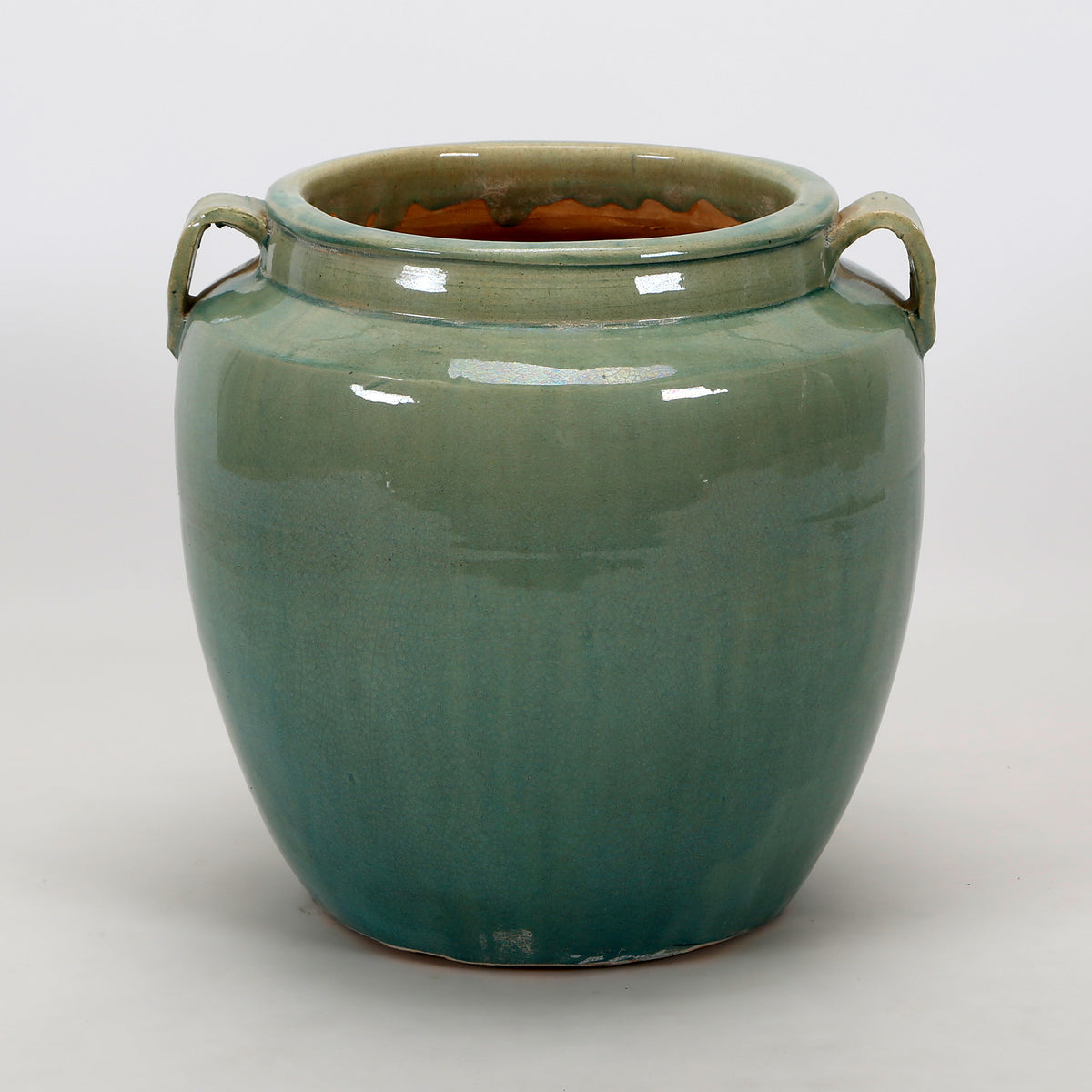 Vintage style green jar with two handles