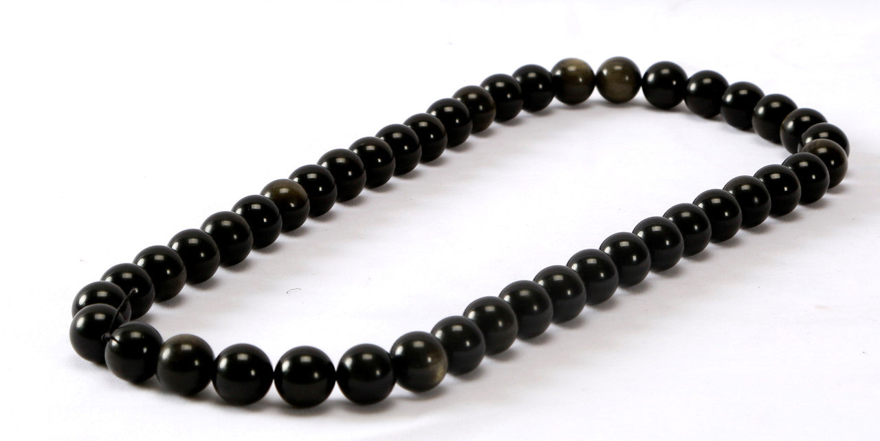 Golden Black Stone Bead Strand ��" image