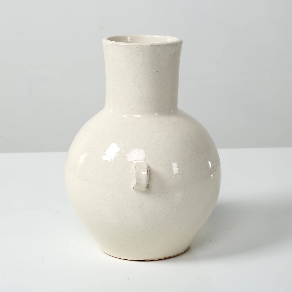 Approx. 10" High Off Whtie Ceramic Vase with Two Decorative Hooks