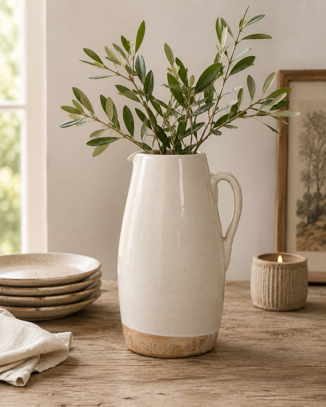 Approx. 9" High Off Whtie Ceramic Pitcher