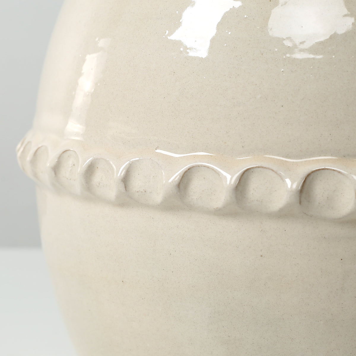 Approx. 11" High Off Whtie Ceramic Vase with Lace Decoration