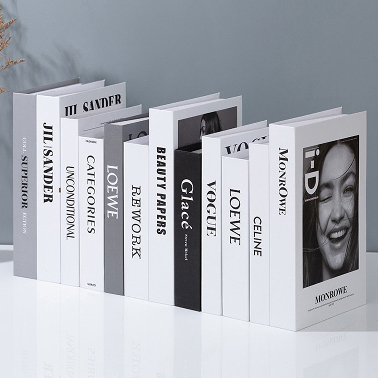 A Set of 12 Decorative Black and White Books