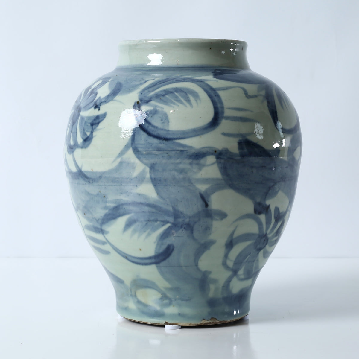 Approx. 11" High Blue and White Jar with Flower Motif