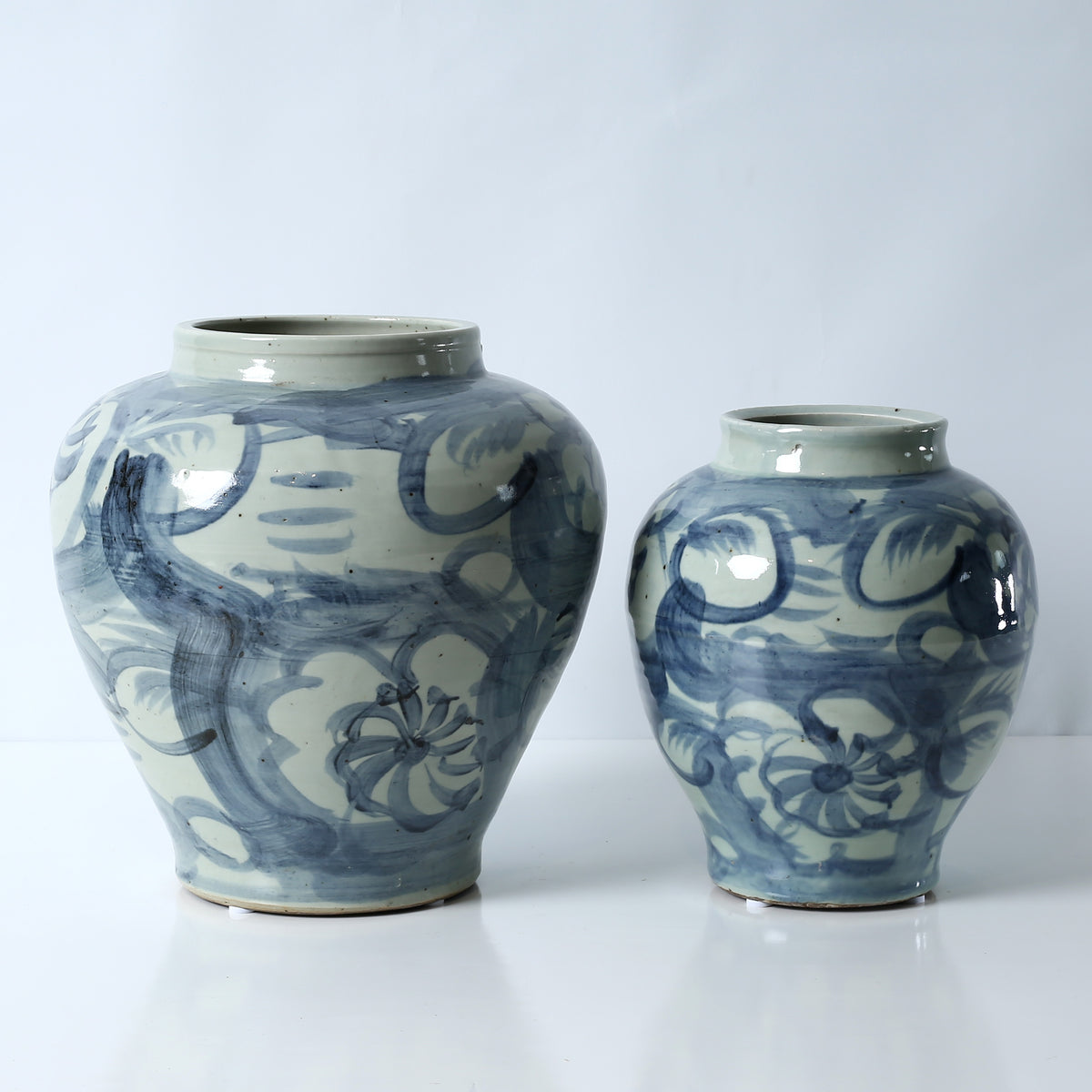 Approx. 11" High Blue and White Jar with Flower Motif