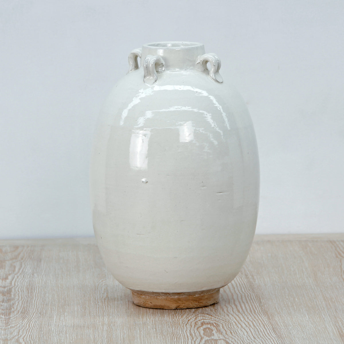 12" Off White Ceramic Pot with Four Handles Unglazed Base