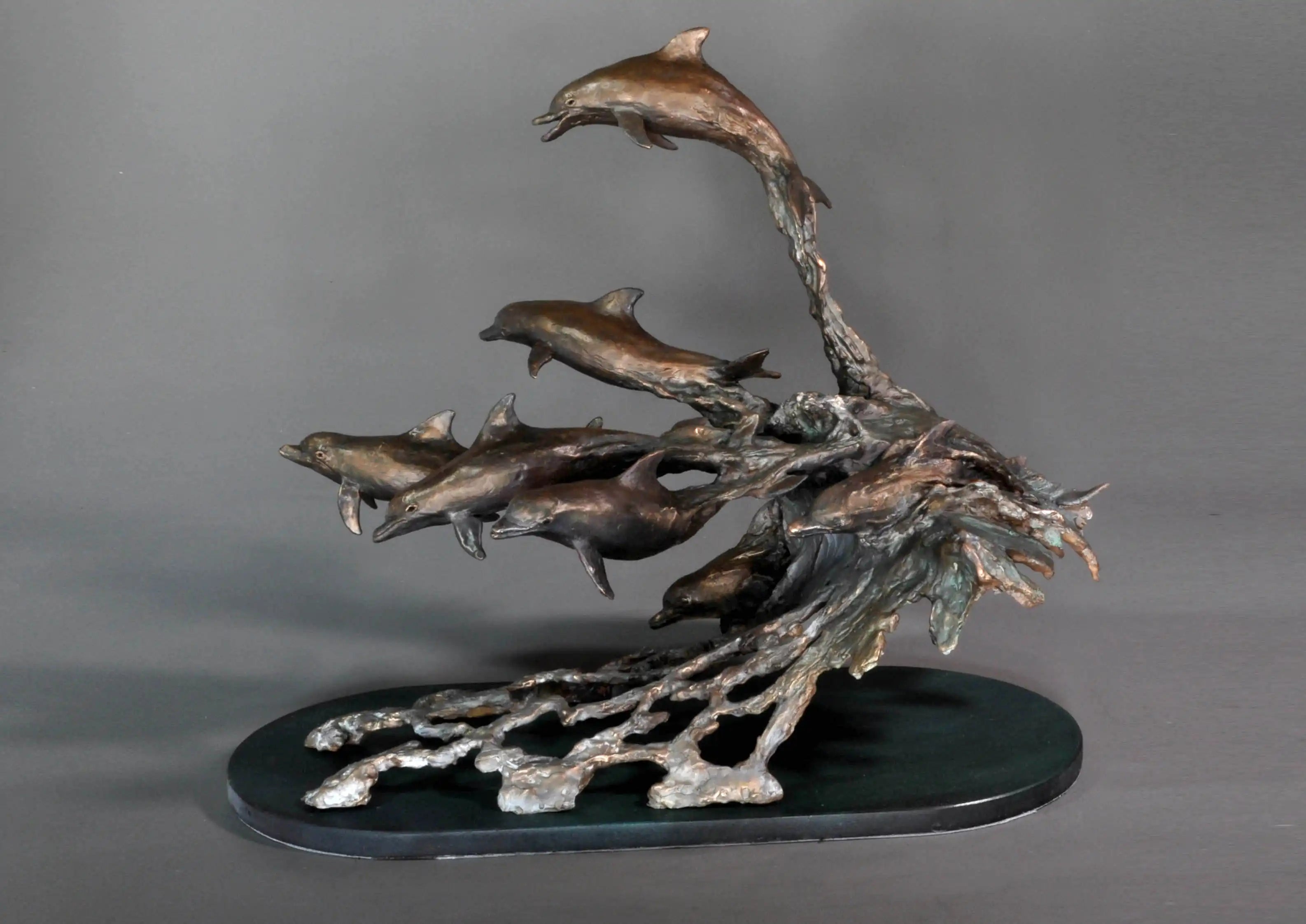 Dolphins surfing