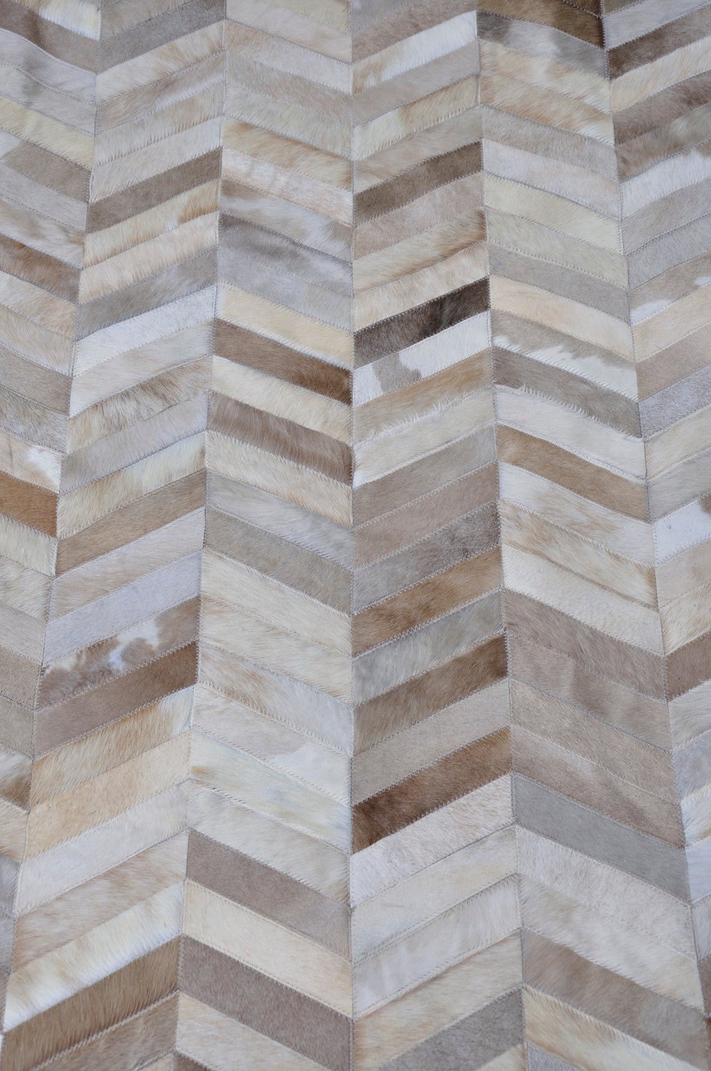 HERRINGBONE WIDE – Custom Patchwork Cowhide Rug for Interior Designers - Homelosophy