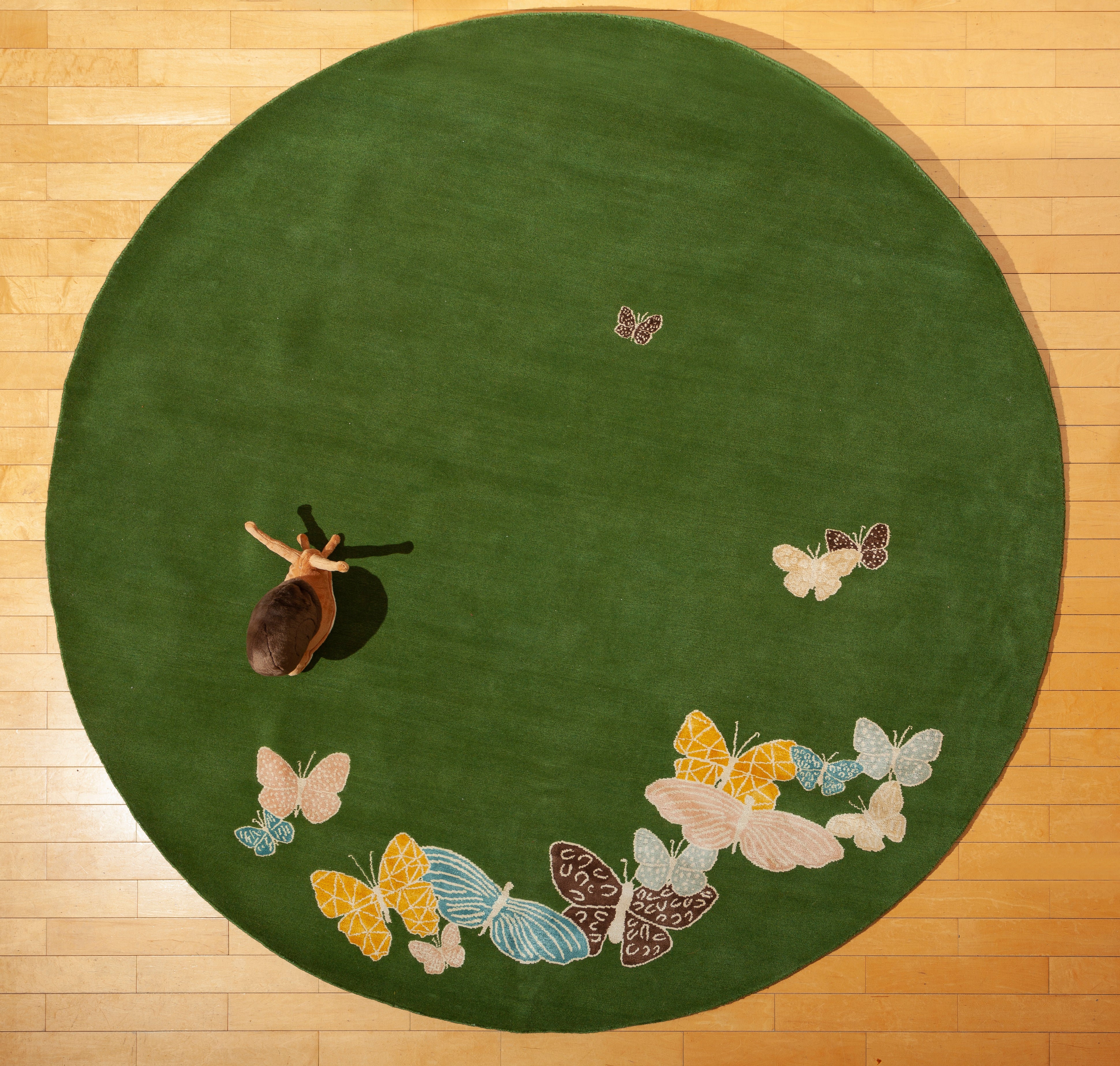 "Spirit in the Sky" - Vibrant Green Round Butterfly Rug in Wool