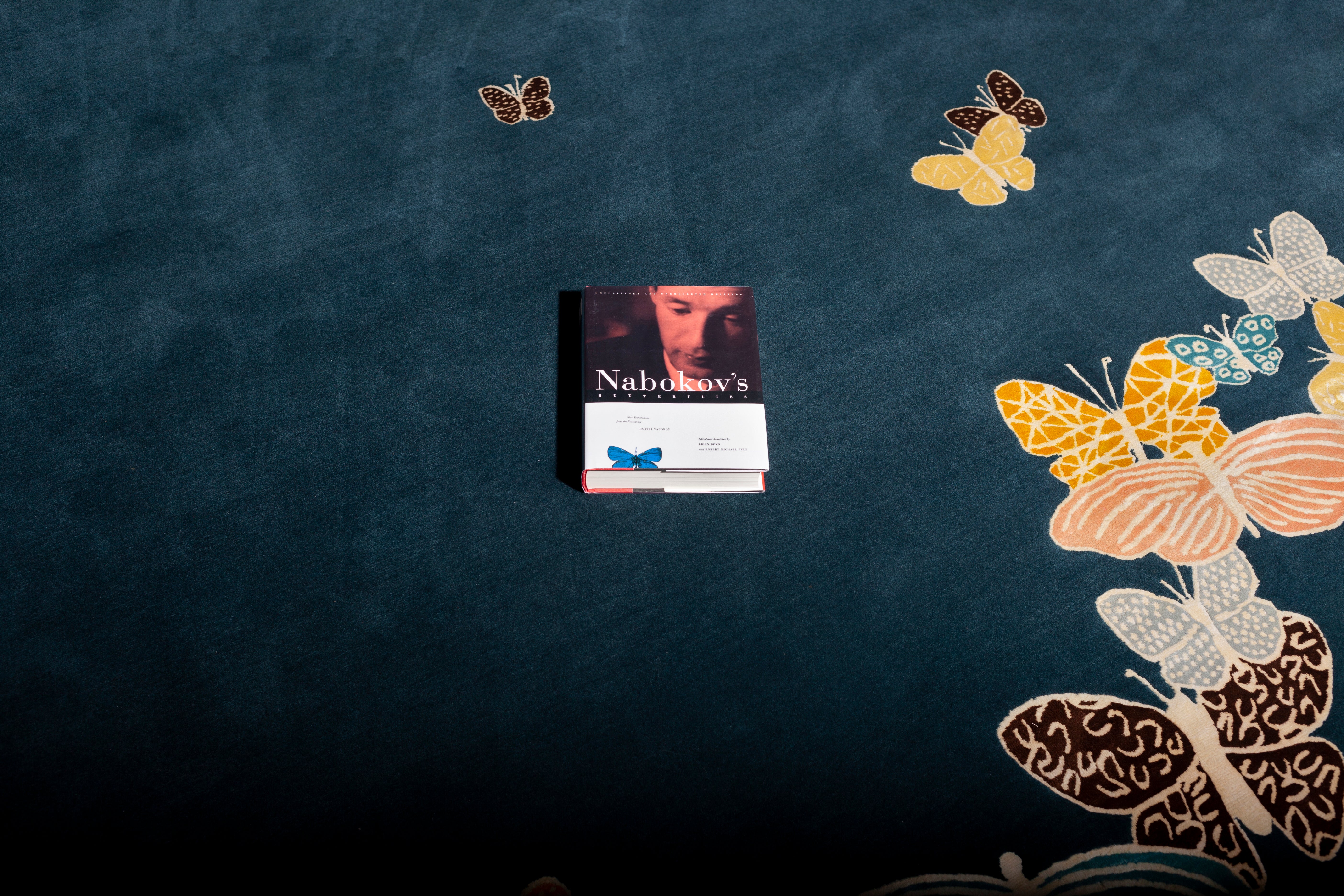 "Spirit in the Night Sky" - Petrol Blue Round Butterfly Rug in